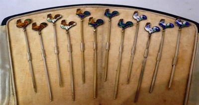 Lot 149 - A set of twelve Sterling and enamel cockerel sticks (cased)