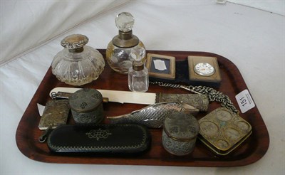 Lot 151 - A small silver framed folding timepiece/photograph frame, three silver mounted scent bottles, a...