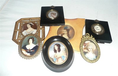 Lot 152 - Six framed miniatures and a Victorian deer-carved brooch mounted as a miniature (7)