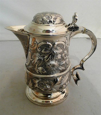 Lot 180 - Embossed silver jug