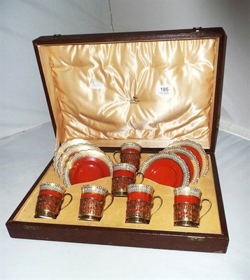 Lot 185 - Set of six Aynsley coffee cups saucers with silver holders in fitted case