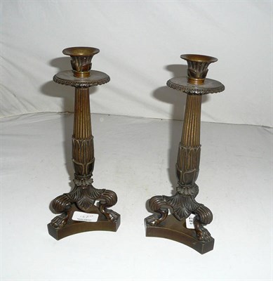 Lot 187 - Pair of bronze candlesticks