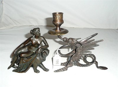 Lot 195 - A bronze figure of Ariadne and the leopard and a bronze dragon candlestick