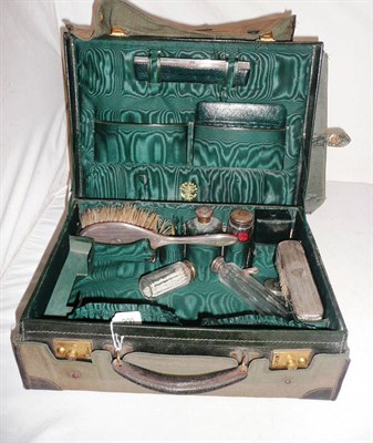 Lot 200 - A black morocco travelling dressing case with silver fittings