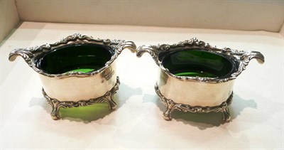 Lot 272 - A pair of silver salts with green glass liners