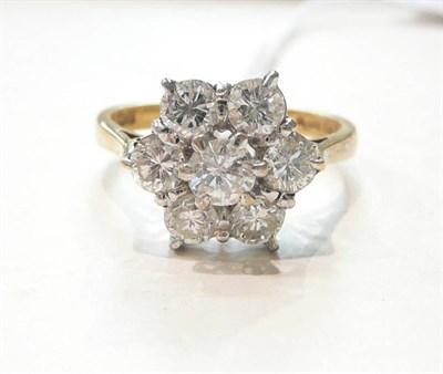 Lot 280 - A diamond seven stone cluster ring