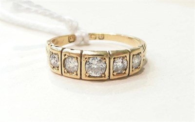 Lot 284 - An 18ct gold diamond five stone ring