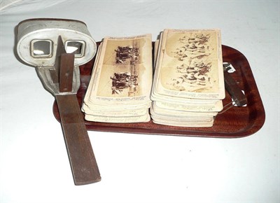 Lot 309 - A stereoscopic viewer and cards