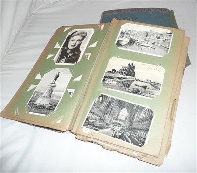 Lot 310 - Two postcard albums (approximately 300 postcards per album)