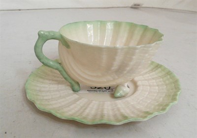 Lot 320 - A First Period Belleek 'Neptune' cup and saucer