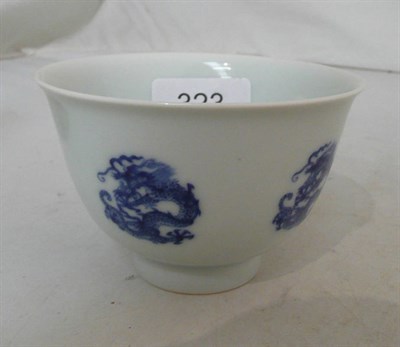 Lot 323 - Chinese porcelain blue and white dragon cup, 20th century, bearing mark of Kangxi