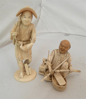 Lot 326 - A Japanese sectional bone figure of a swordsmith and another of a fisherman with cormorant