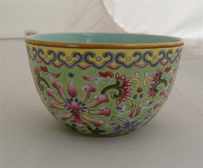 Lot 329 - An enamelled porcelain wine cup bearing seal mark of Qianlong