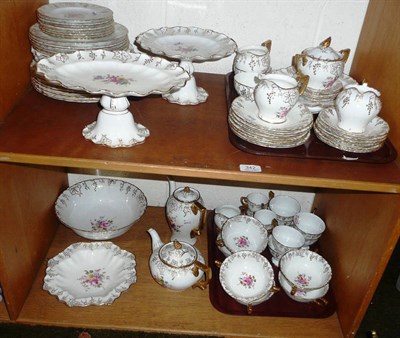 Lot 342 - Royal Crown Derby 'Vine' pattern dinner, tea and coffee service on two shelves