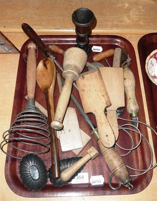 Lot 364 - Tray of assorted kitchenalia including butter pats, brass-mounted pastry wheels, moulds, treen...