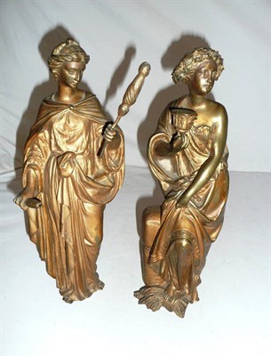 Lot 367 - A pair of gilt bronze models of classical women, one signed with the monogram UA