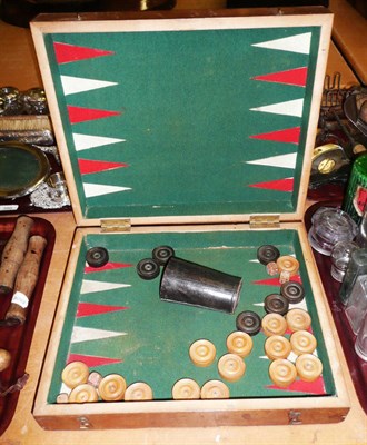 Lot 385 - Backgammon board and checkers