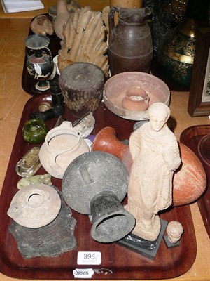 Lot 393 - Two tray of assorted carvings, antique pottery including oil lamps, minerals etc