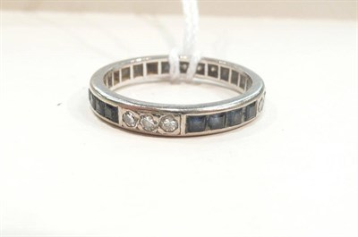 Lot 407 - Sapphire and diamond full eternity ring