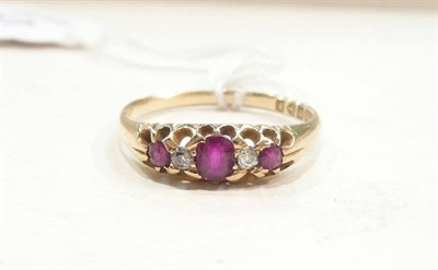 Lot 414 - An 18ct gold ruby and diamond five stone ring, hallmarked Chester 1900