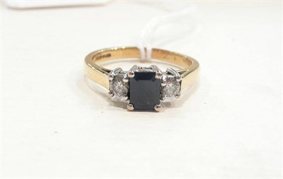 Lot 420 - An 18ct gold sapphire and diamond three stone ring