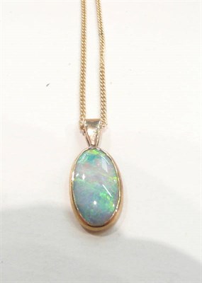 Lot 427 - An opal pendant on a 9ct chain