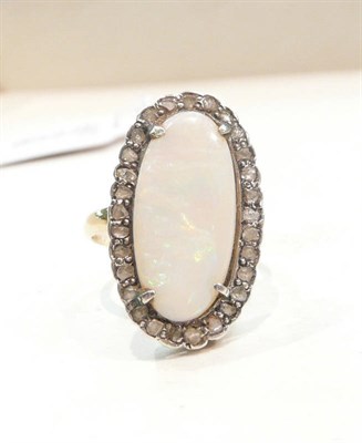 Lot 434 - An opal and diamond cluster ring