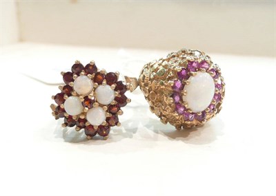 Lot 441 - A 9ct gold garnet and opal cluster ring, and a 9ct gold ruby and opal cluster ring