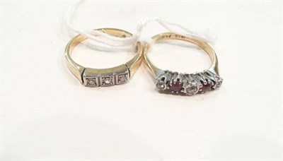 Lot 446 - A ruby and diamond five stone ring, and a diamond three stone ring