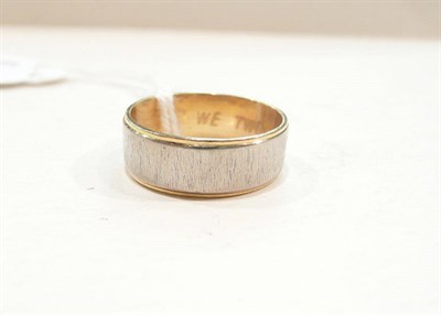 Lot 447 - A two colour 18ct gold band ring