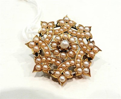 Lot 448 - A Victorian split pearl brooch in star form