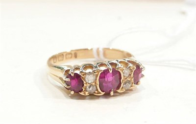 Lot 457 - An 18ct gold ruby and diamond ring