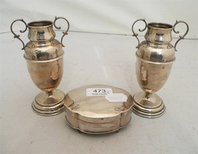 Lot 473 - A pair of silver two handled vases, loaded and silver trinket box (3)