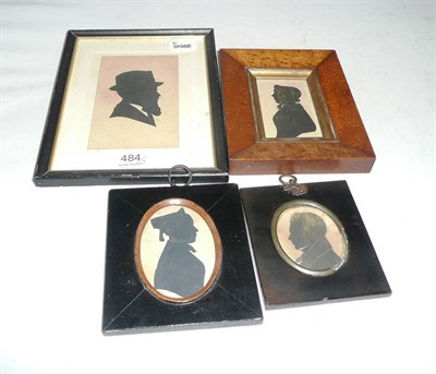 Lot 484 - A 19th century silhouette of a lady in a maple frame and three other silhouettes