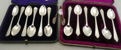 Lot 490 - A set of six silver teaspoons, London 1910 (cased), a set of six silver teaspoons, Birmingham...