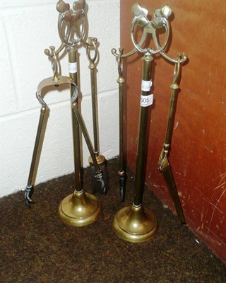 Lot 505 - Brass companion set of four implements and two stands