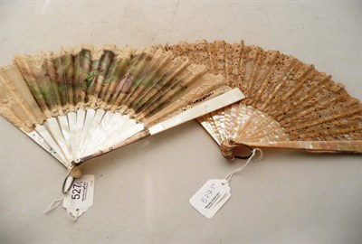 Lot 527 - Late 19th Century Mother Of Pearl Fan on a lace mount with steel cut decoration, 23 cms;...