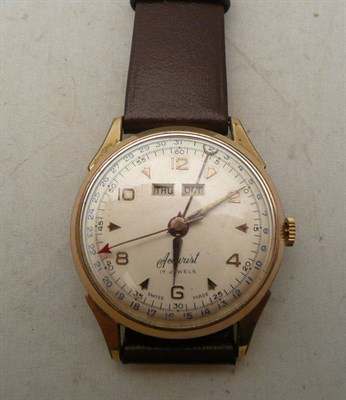 Lot 534 - A steel and rolled gold triple calendar wristwatch signed 'Accurist'