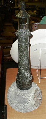 Lot 551 - Green marble lighthouse lamp