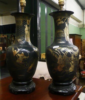 Lot 560 - Pair of Japanese black and gilt lacquer lamps