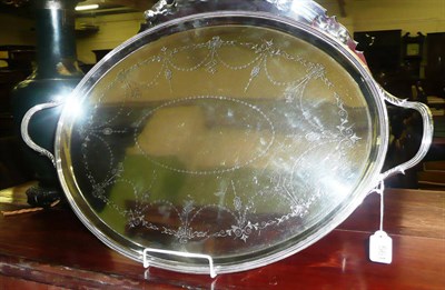 Lot 561 - Oval silver two-handled tray decorated with swags and garlands, 84.8oz