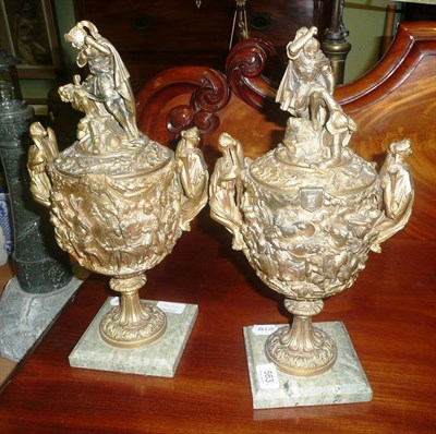 Lot 563 - A pair of gilt brass cast urns, later gold painted