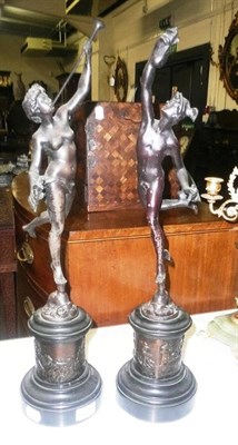 Lot 569 - A pair of bronzed spelter figures of Mercury and companion