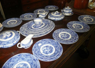 Lot 573 - A Cauldon 'Blue Moore'  pattern twelve setting dinner service including two tureens, two sauce...