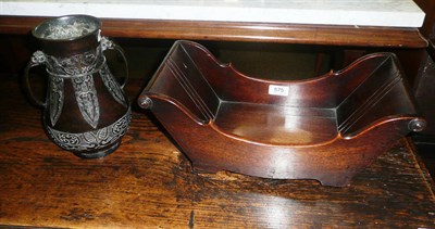 Lot 575 - A mahogany cheese boat and a Japanese twin handled vase