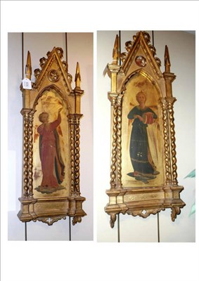 Lot 606 - A pair of icons in carved gilt wood frames