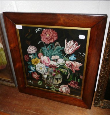 Lot 633 - A floral needlework panel in a glazed rosewood frame