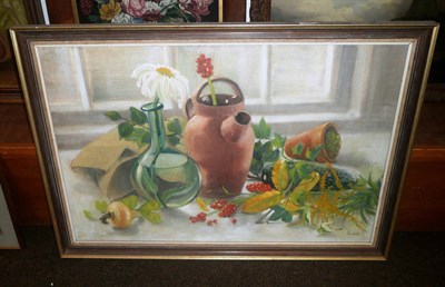 Lot 637 - Judith Bluck, still life of flowers, berry's and a glass bottle. Signed and dated 1964, oil on...