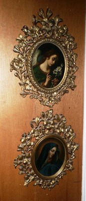 Lot 648 - Pair of oils on board, circle of Carlo Dolci, Archangel Gabriel with Lily and the Madonna, in...