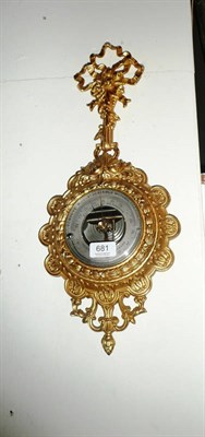 Lot 681 - A gilt metal aneroid barometer